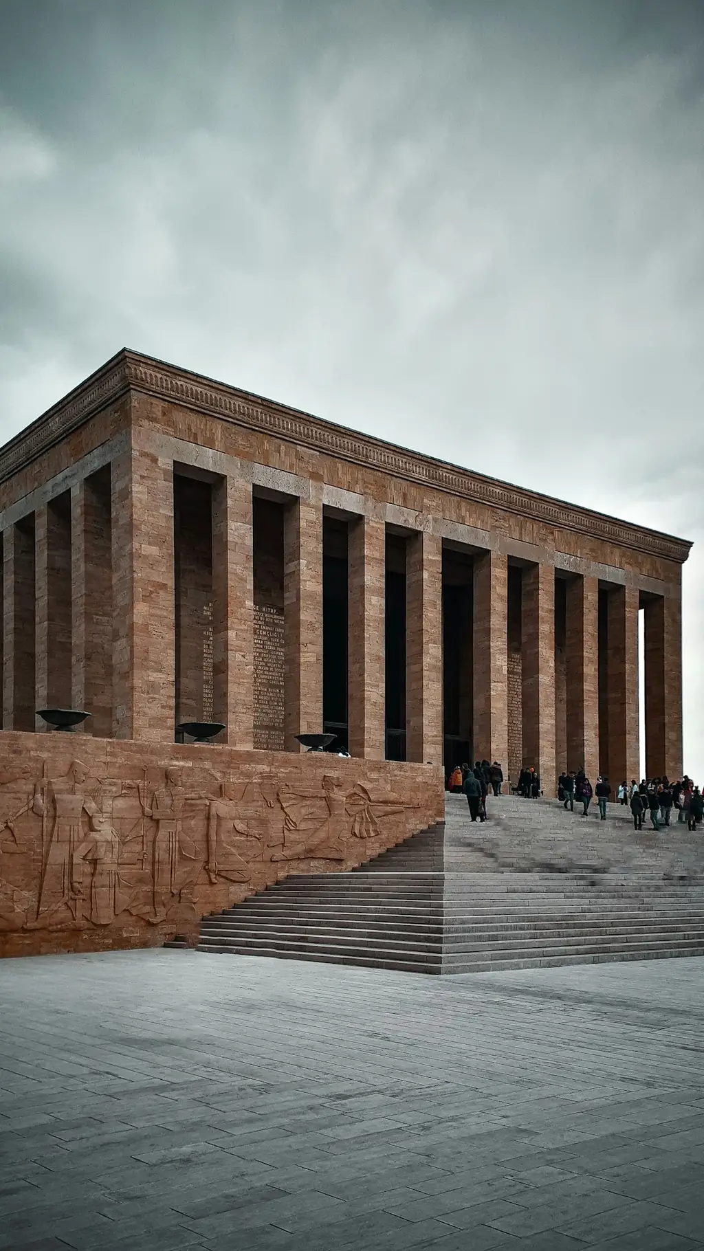 a very large building with some steps in front of it